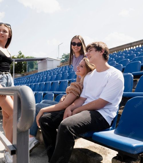 medium-shot-friends-sitting-outdoors_23-2149070159